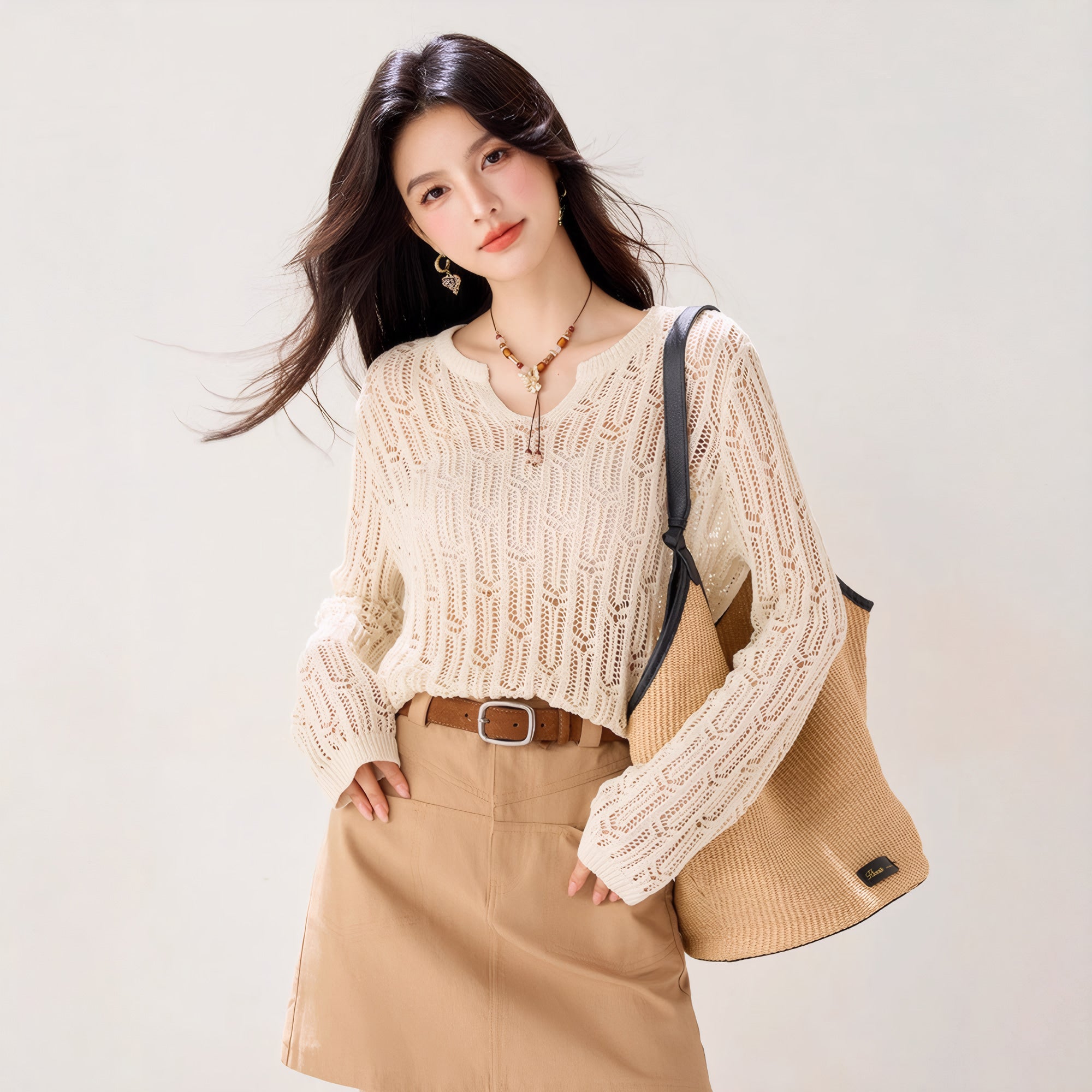 ELNOVÉ Solène Durchbroch-Strickpullover - Sweater