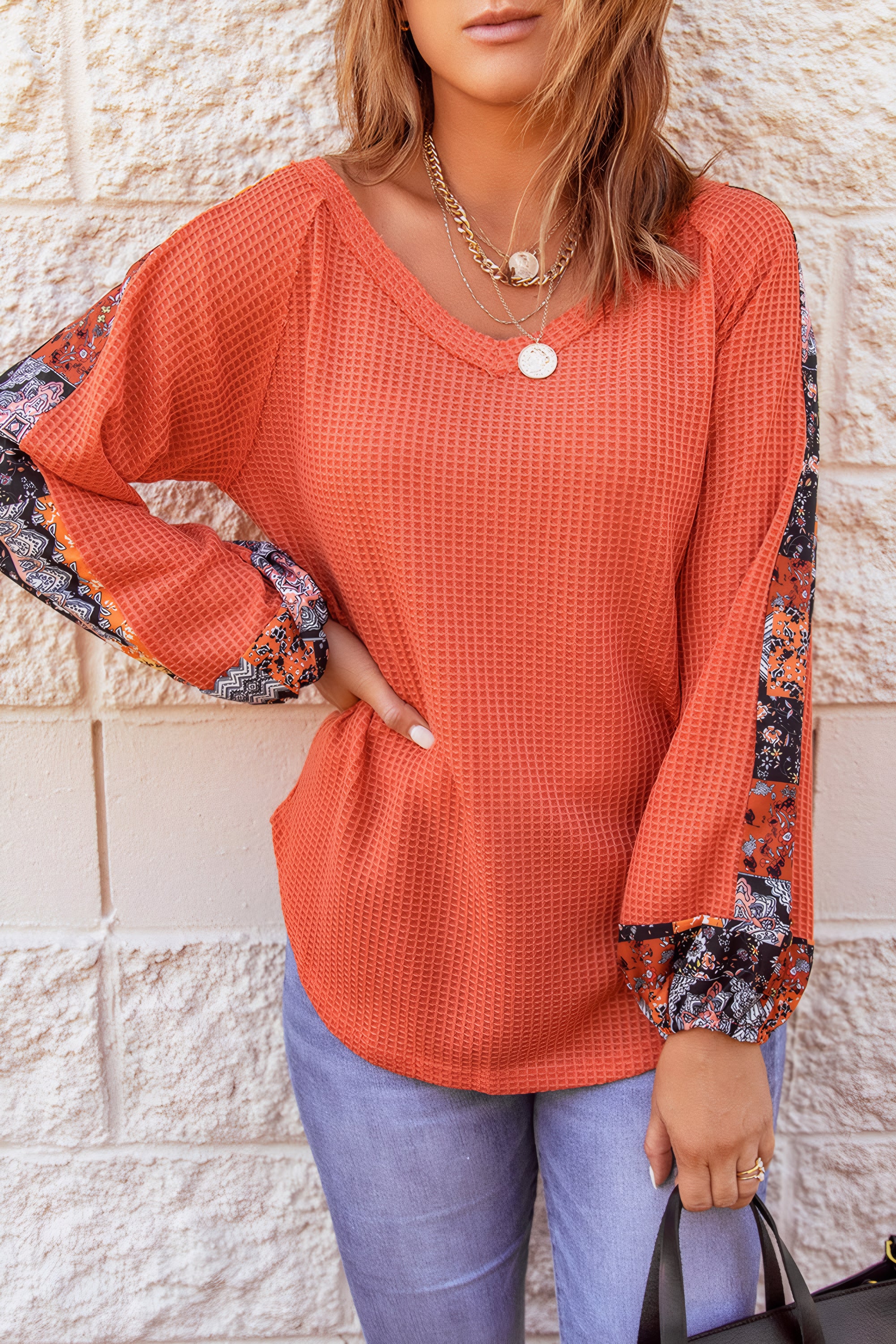Pull thermique orange en maille