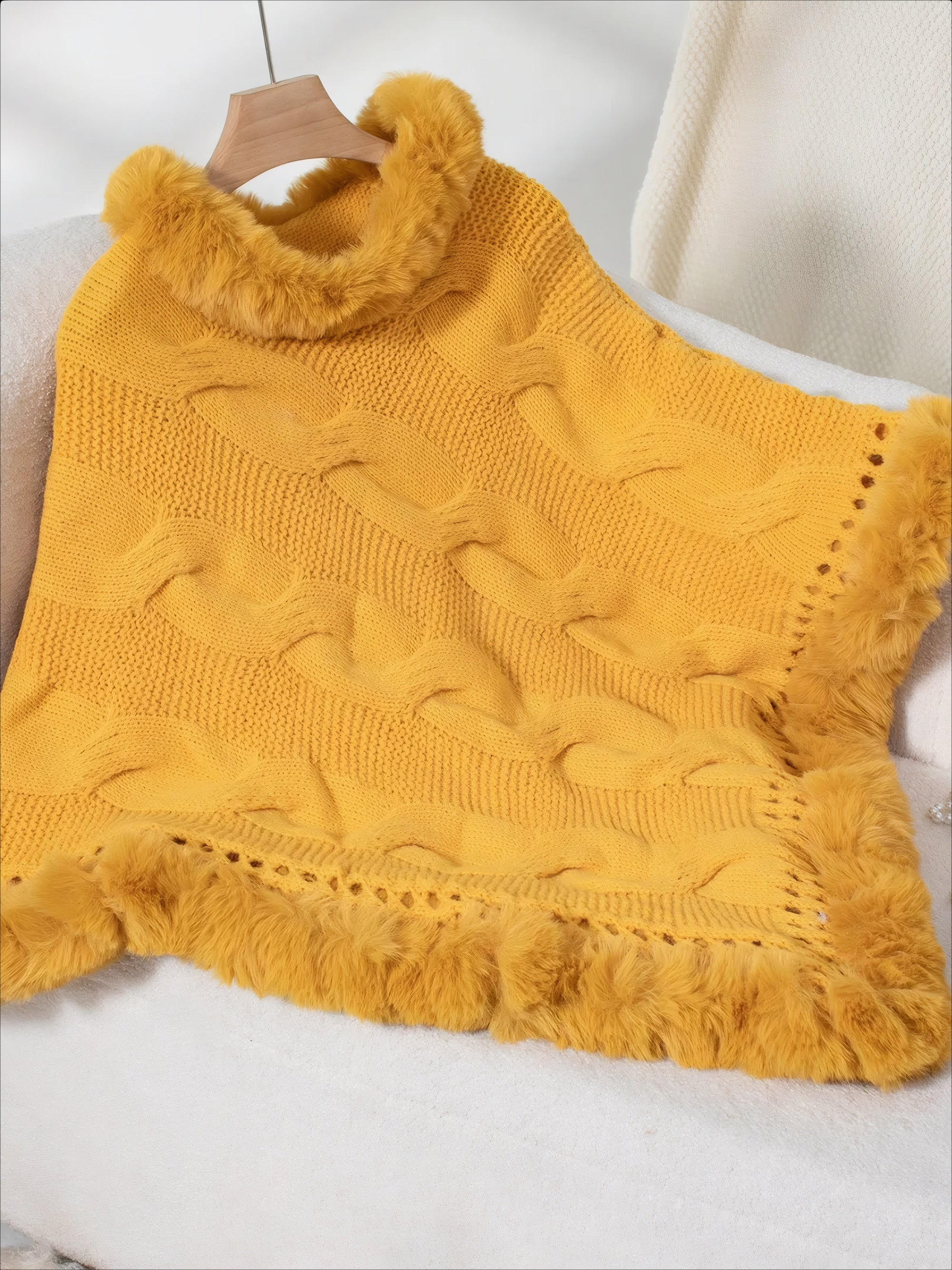 ELNOVÉ Renée Zopfmuster-Poncho