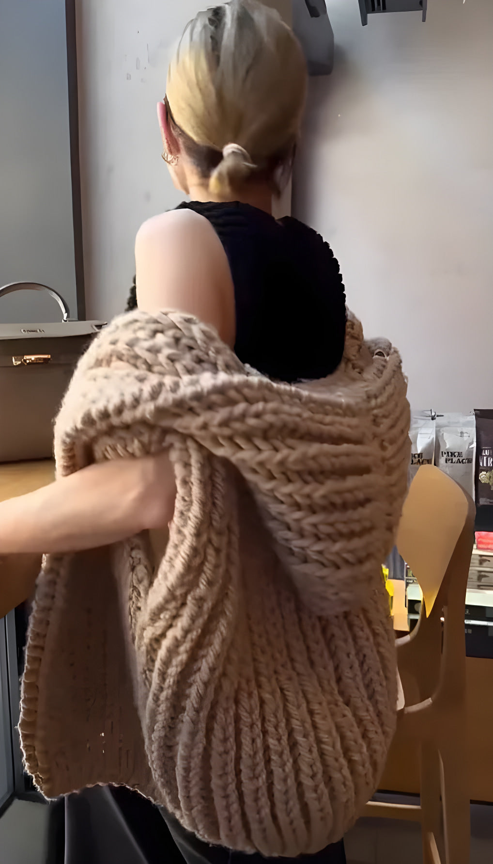 gilet in maglia con cappuccio